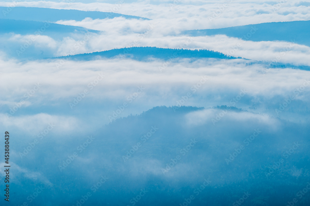 blue sky and clouds and foggy mountains blue sky and clouds and foggy mountains