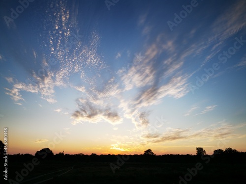 Sky in the evening when the sun is setting over the fields