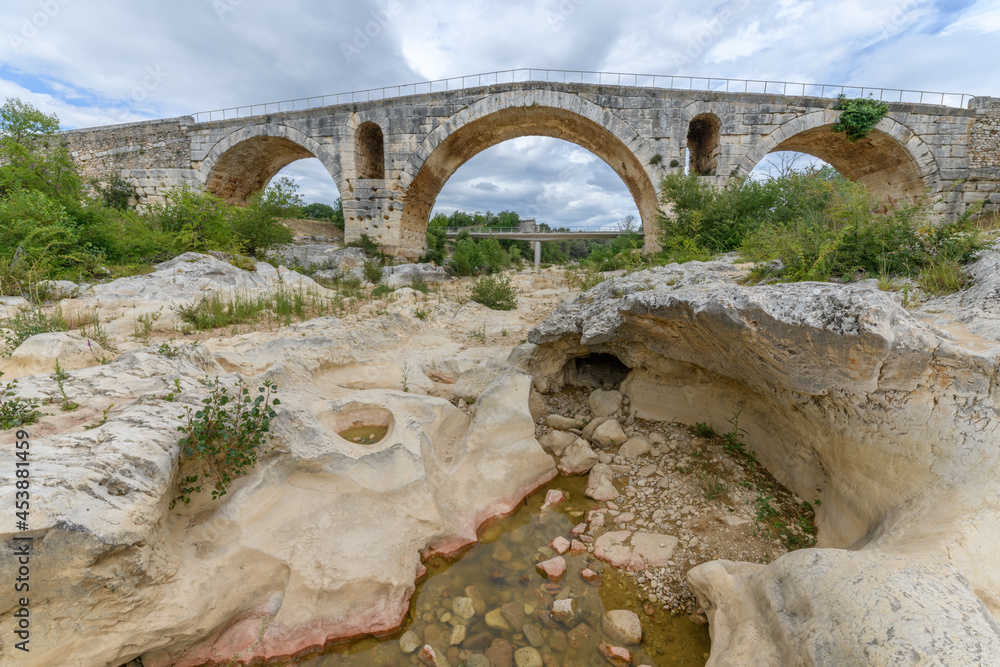 The Julien bridge, Roman bridge over the Calavon river. Roman bridge in the Luberon located on the Via Domitia. The Julien bridge, Roman bridge over the Calavon river. Roman bridge in the Luberon located on the Via Domitia.