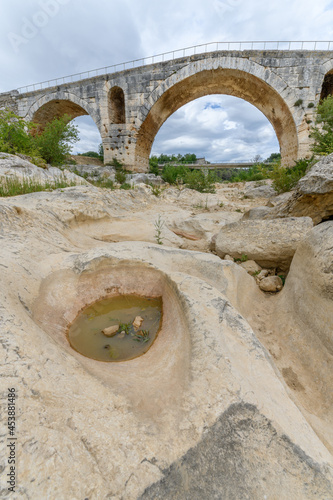 The Julien bridge, Roman bridge over the Calavon river. Roman bridge in the Luberon located on the Via Domitia. photo