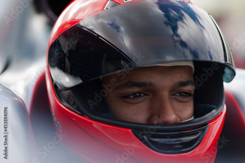 Принти на полотні Close up of racer wearing helmet