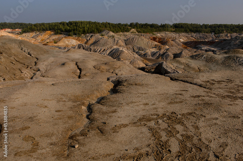 The clay quarry resembles a cosmic landscape.Ural Mars.An original landscape in the Sverdlovsk region in Russia.Top view of the hills made of refractory clay.A unique place created by man and nature