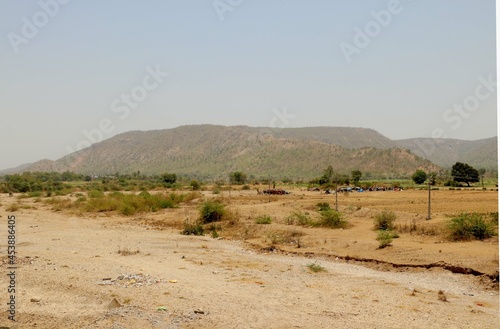 View of dry river in India with background of nature and mountain