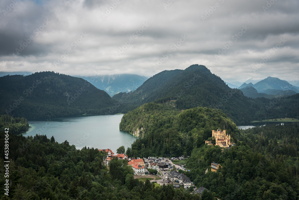 Scenic view with Alpsee lake and Hohenschwangau castle in the Bavarian alps on a stormy day, Schwangau, Bavaria, Germany