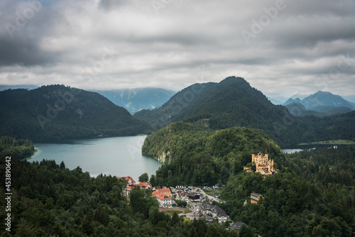 Scenic view with Alpsee lake and Hohenschwangau castle in the Bavarian alps on a stormy day  Schwangau  Bavaria  Germany
