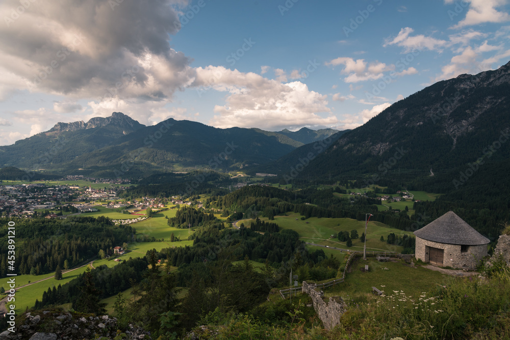 Alpine green landscape in summer on a cloudy day, Reutte, Austria Alpine green landscape in summer on a cloudy day, Reutte, Austria