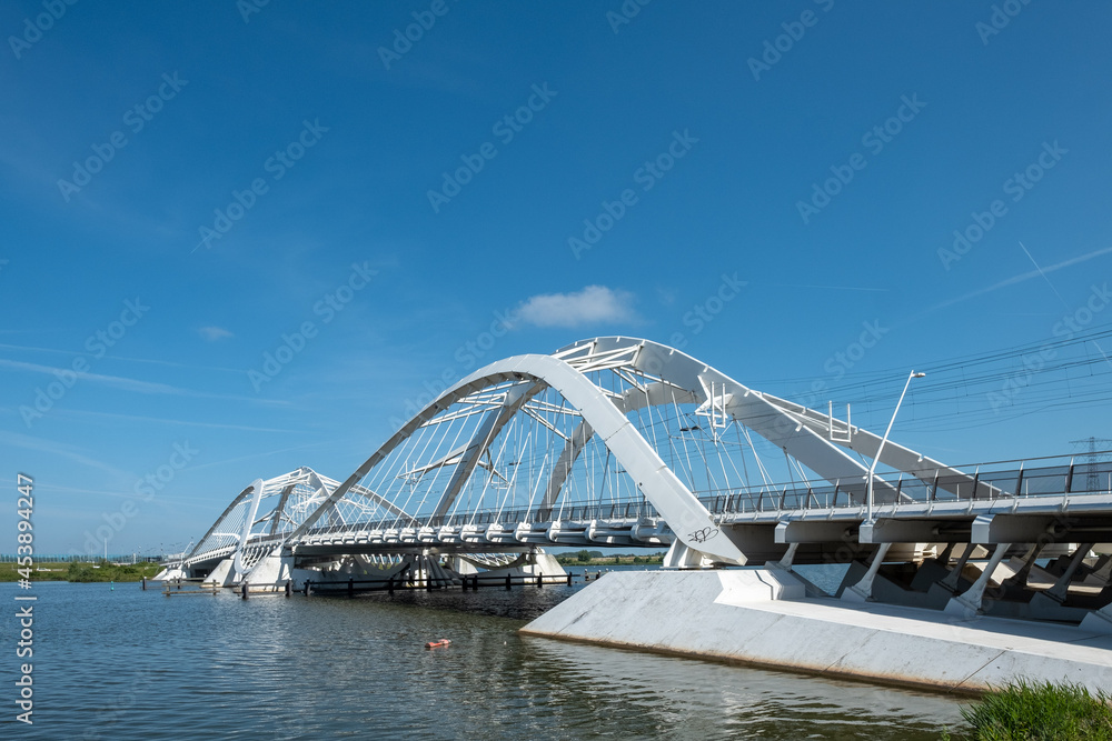 Obraz premium The Enneus Heerma Bridge in Amsterdam IJburg, Noord-Holland province, The Netherlands