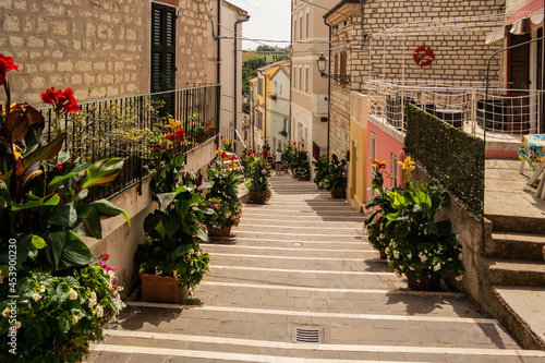 Fototapeta Naklejka Na Ścianę i Meble -  View on the beautiful staircase with flowers of Numana, Riviera del Conero, Marche - Italy
