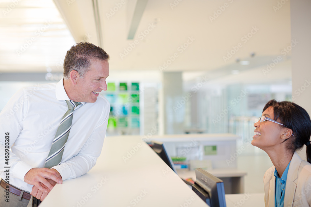 Business people talking in office Business people talking in office