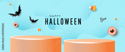 Halloween podium banner or party invitation background with candy, spider and flying bats. Design template for advertising, web, social media.