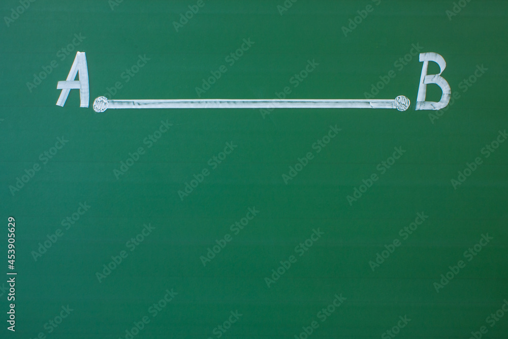 A straight segment with two points A and B drawn in white chalk on a green blackboard close-up and space for copying
