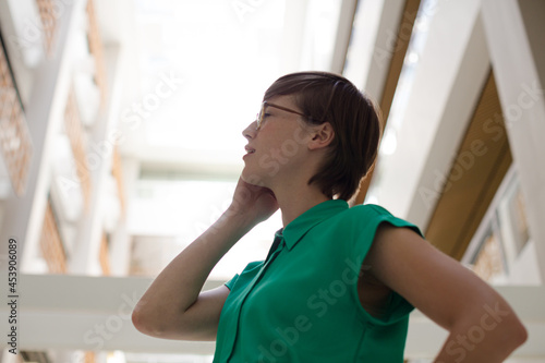 Free Download Businesswoman using cell phone outdoors - GFXLoad