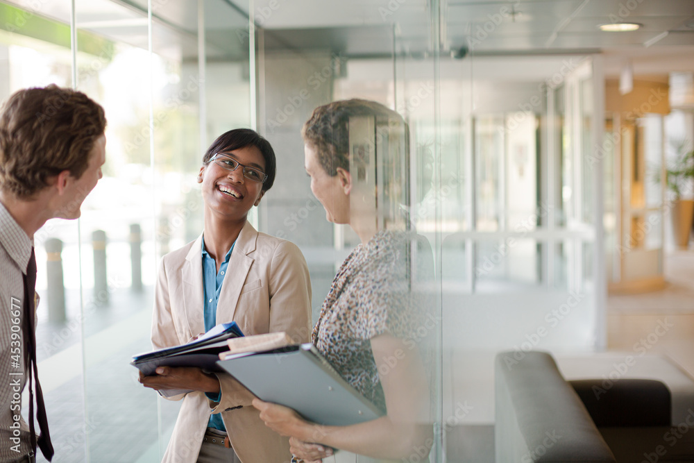 Business people talking in office Business people talking in office