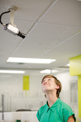Businesswoman making face at security camera Free Download Businesswoman making face at security camera - GFXLoad