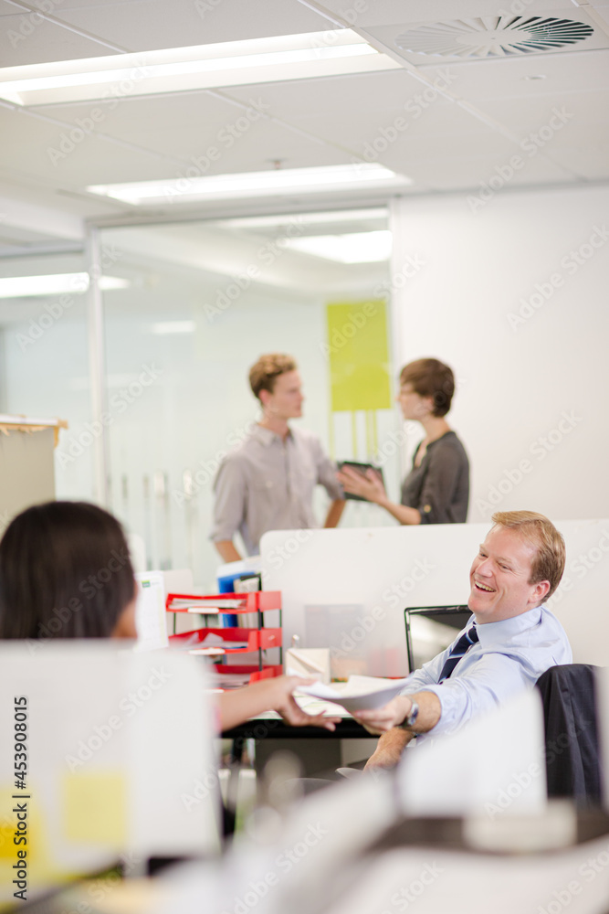 Business people talking in office Business people talking in office