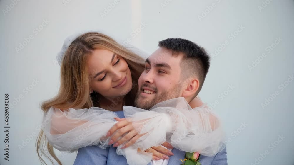 Beautiful bride and groom swinging with smile looking at camera. Relationship couple wedding newlyweds. Marriage girlfriend bride. Smiling wedding partners swing together. Enjoy couple boyfriend groom Beautiful bride and groom swinging with smile looking at camera. Relationship couple wedding newlyweds. Marriage girlfriend bride. Smiling wedding partners swing together. Enjoy couple boyfriend groom