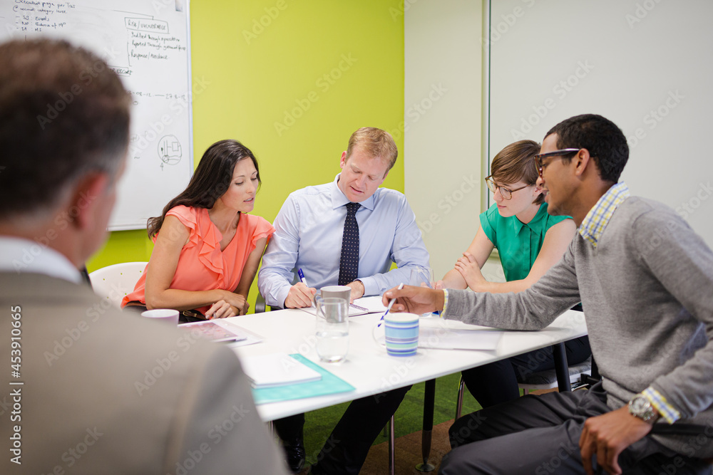 Business people talking in meeting Business people talking in meeting