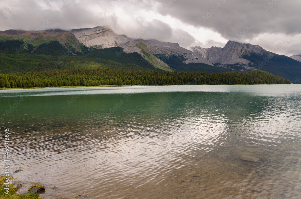 Maligne Lake in cloudy day in summer in Jasper in Banff National Park, Alberta, Canada
