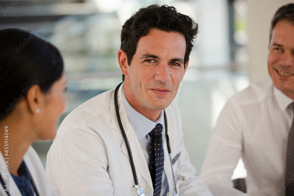 Doctors talking in meeting Doctors talking in meeting