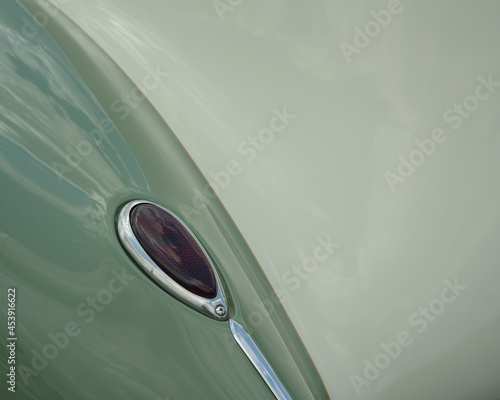 Tear drop shaped tail light on a gorgeous classic american restored automobile photo