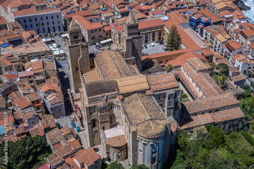 View from La Rocca mountain on Cathedral in Old Town of Cefalu town, Sicily Island, Italy photo