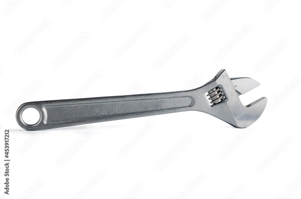 silver-colored adjustable wrench insulated on a white background silver-colored adjustable wrench insulated on a white background