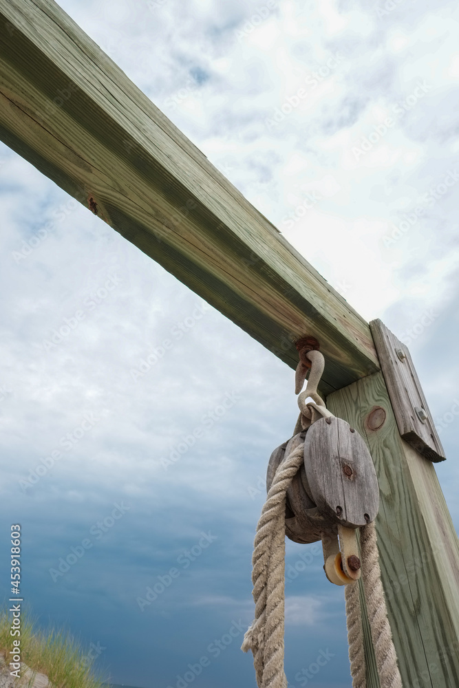 Boat pulley and rope on a cloudy rainy day Boat pulley and rope on a cloudy rainy day