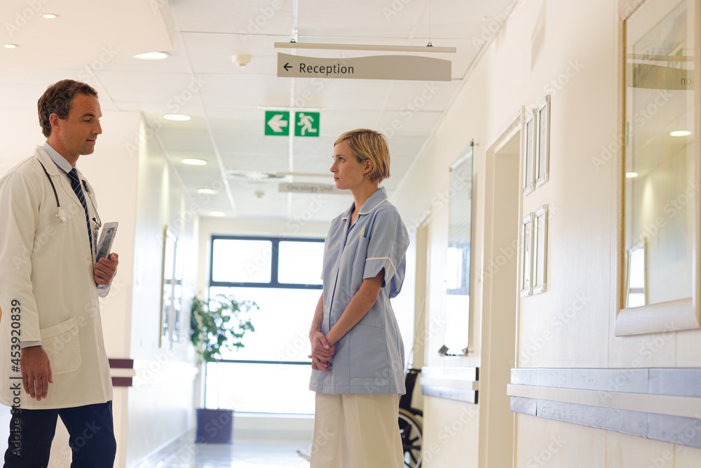 Nurse and doctor talking in hospital Nurse and doctor talking in hospital