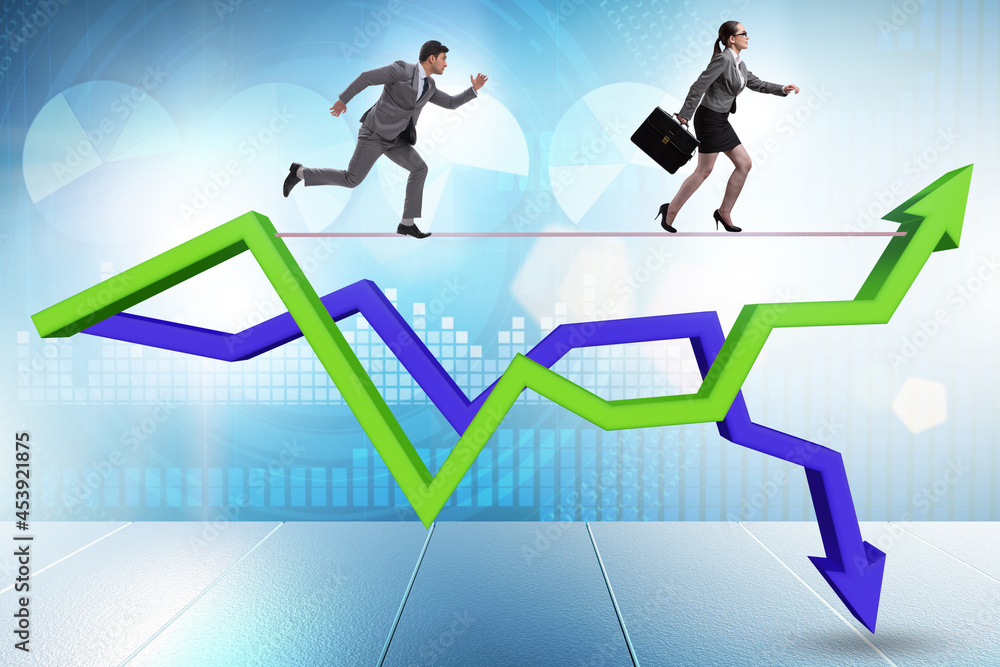 Businessman balancing on tightrope on line chart Businessman balancing on tightrope on line chart