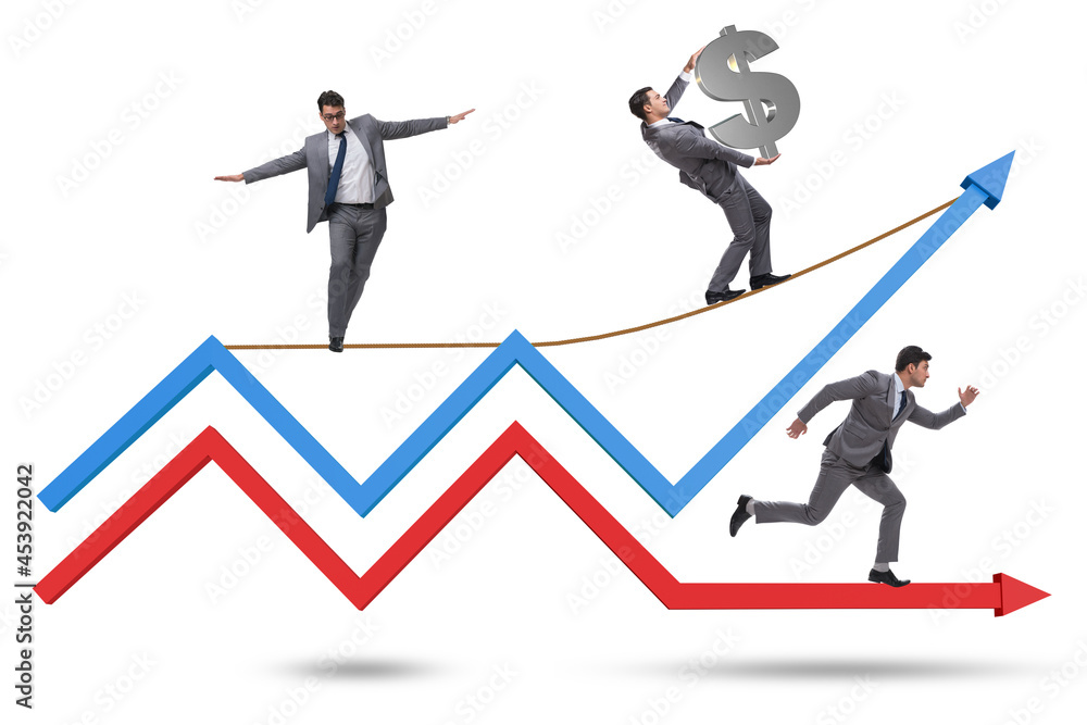 Fototapeta premium Businessman balancing on tightrope on line chart