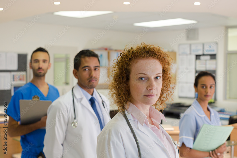 Fototapeta premium Doctors and nurse smiling in hospital