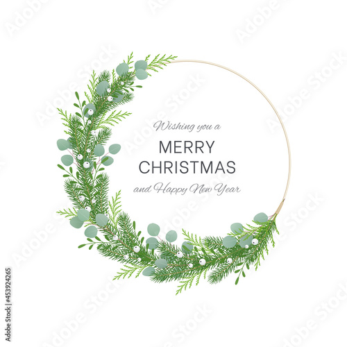 Modern spruce Christmas wreath with eucalyptus branches, thuja and mistletoe berries. Isolated on a white background. For festive decoration of cards, invitations, posters, banners, social media posts