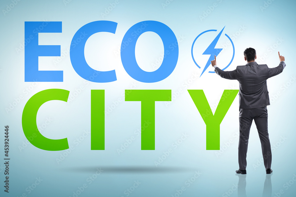 Eco city in ecology concept with businessman Eco city in ecology concept with businessman