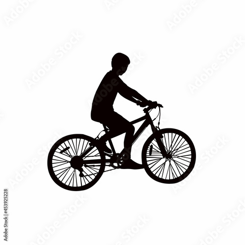 Fototapeta Naklejka Na Ścianę i Meble -  a boy riding bicycle, body silhouette vector