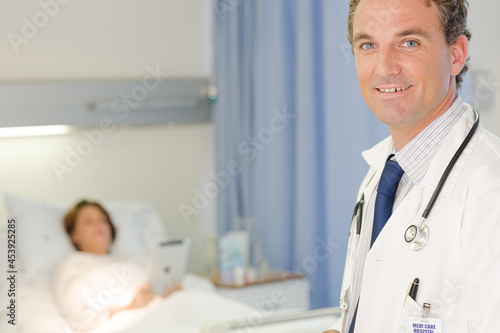 Doctor smiling in hospital room