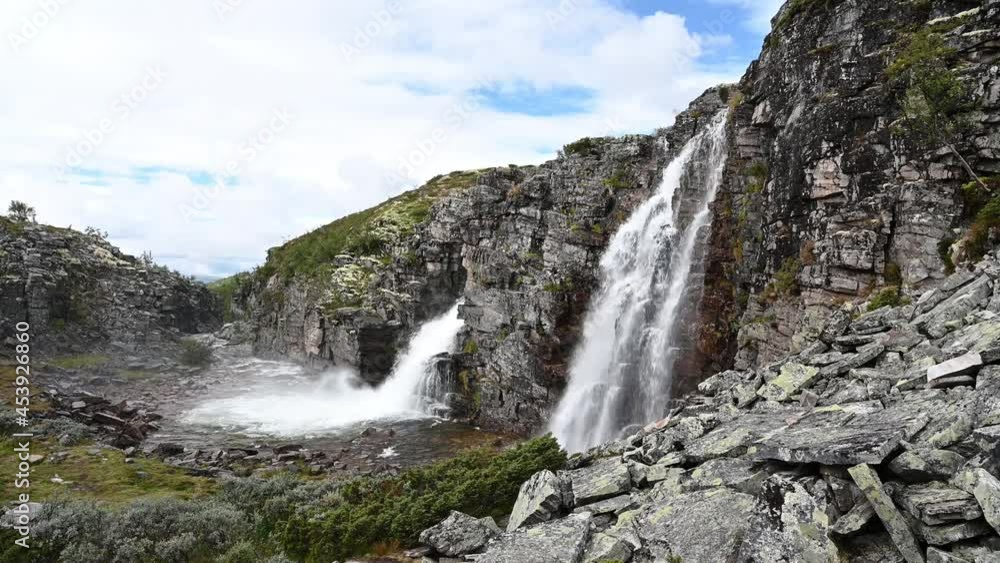 The Storulfossen Waterfall in the Rondane National Park in Norway. The Storulfossen Waterfall in the Rondane National Park in Norway.