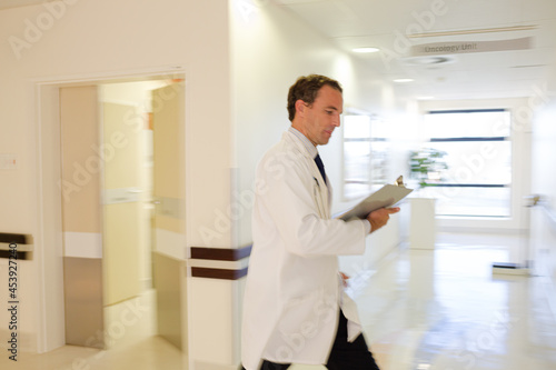 Wallpaper Mural Doctor rushing in hospital hallway Torontodigital.ca