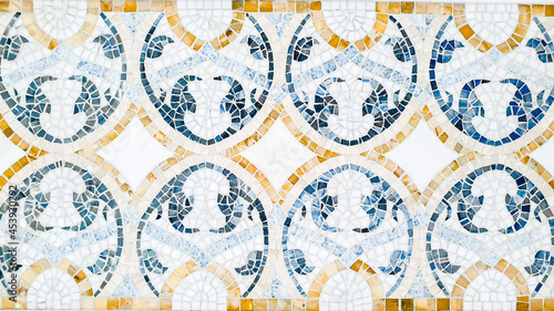 Detail of old arab mosaic with colors of blue, light blue, orange brown and white
