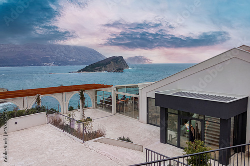 Restaurant on the hill and view of the Budva bay photo