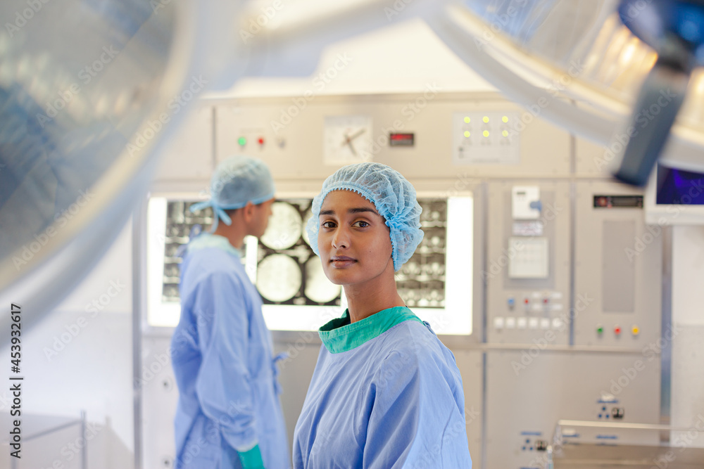Surgeon standing in operating room Surgeon standing in operating room