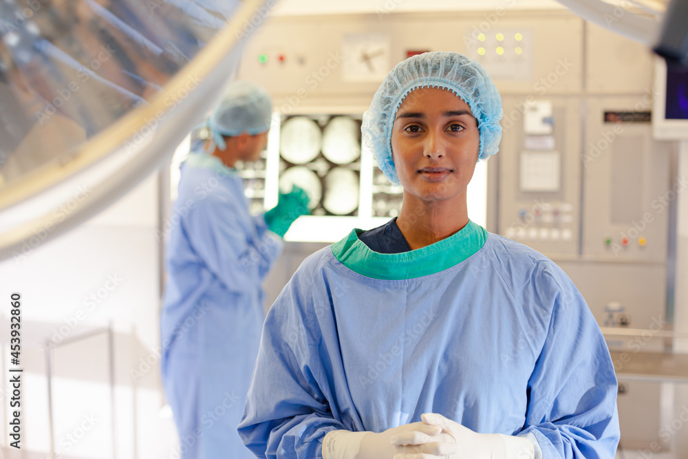 Surgeon standing in operating room