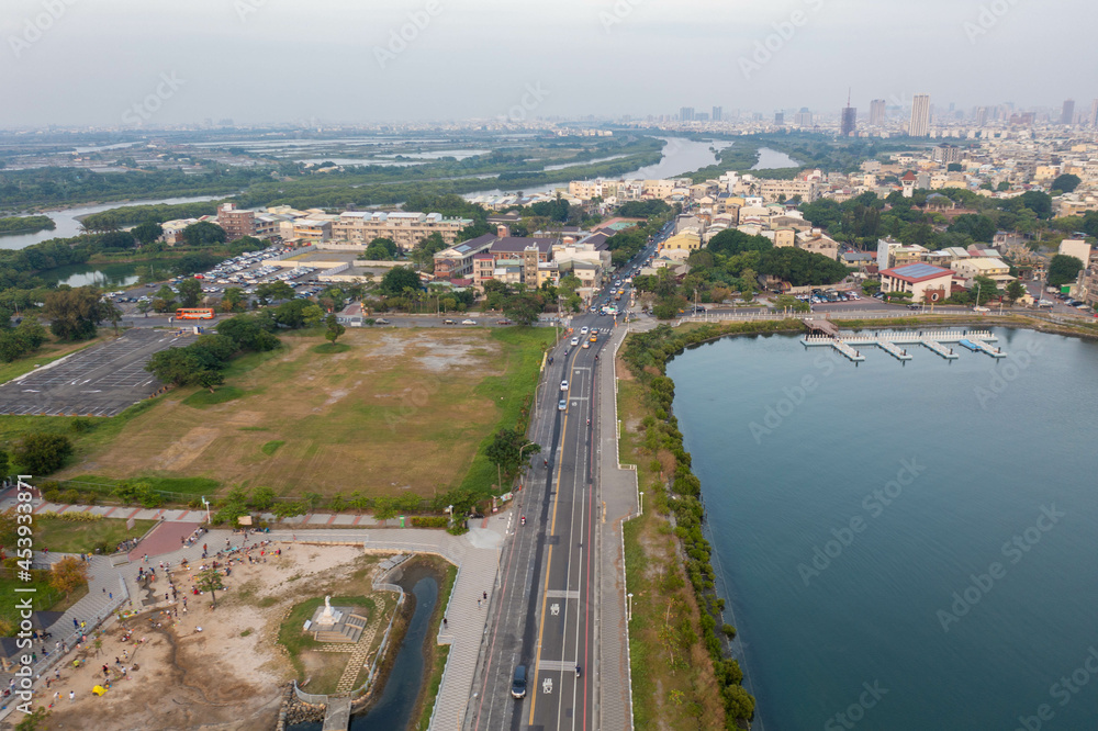 Fototapeta premium 台湾の台南市の田園風景をドローンで撮影した空撮写真 An aerial drone shot of the countryside in Tainan, Taiwan. 