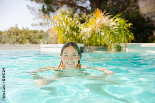 Woman swimming in pool © KOTO