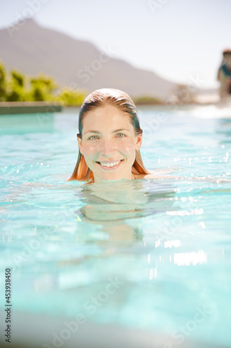 Woman swimming in pool © KOTO