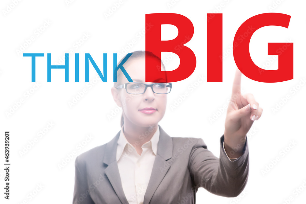 Think big concept with businesswoman Think big concept with businesswoman