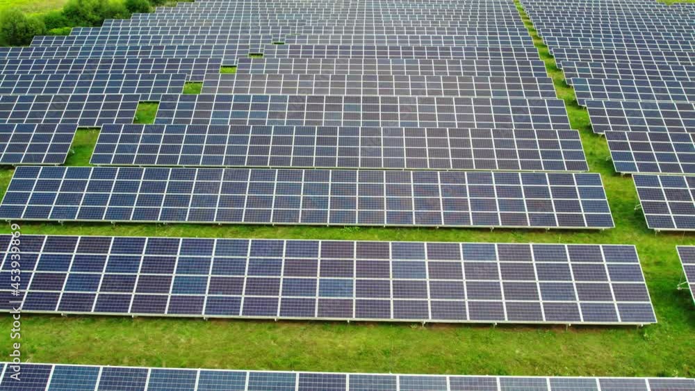 Solar panels on green field. Solar panels system power generators from sun. Clean technology for better future.
Solar panels on green field. Solar panels system power generators from sun. Clean technology for better future.
