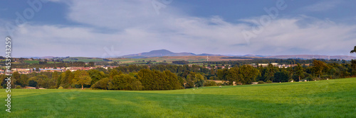 Panoramic view of the green Scottish countryside with Tinto Hill at the far distance