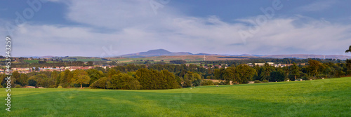 Panoramic view of the green Scottish countryside with Tinto Hill at the far distance photo