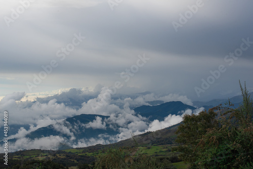 Cloudy horizontal landscape Colombian mountain range with clouds and mountains and sun Vía Nacional Letras © FranciscoStockLife