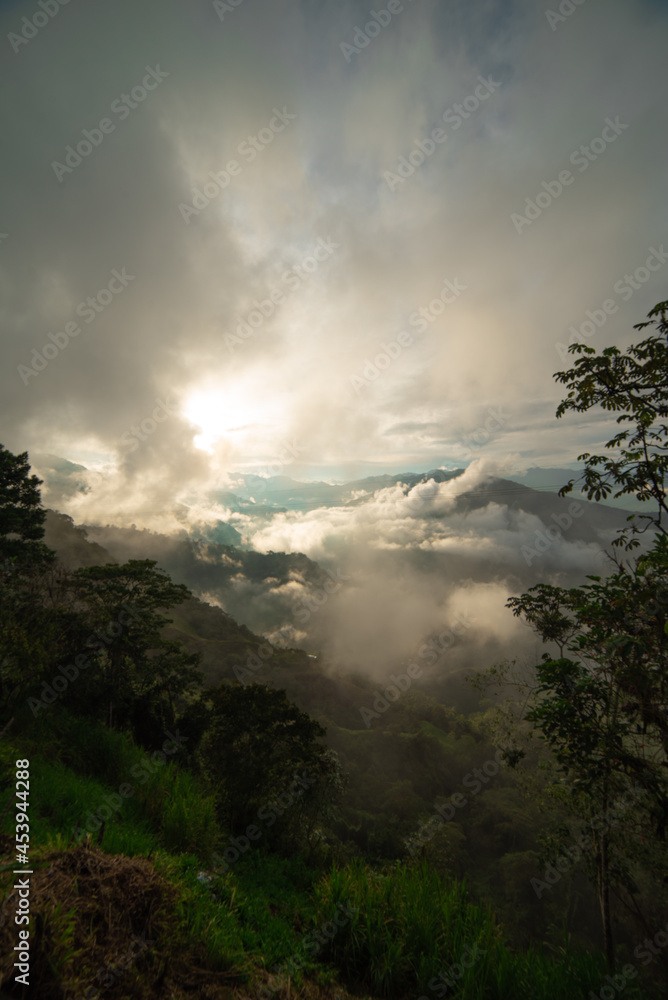 Cloudy horizontal landscape Colombian mountain range with clouds and mountains and sun Vía Nacional Letras